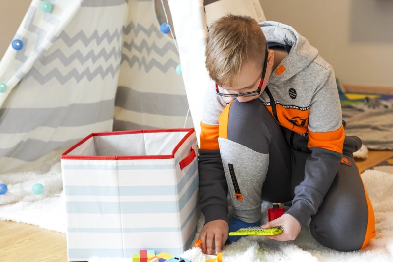 Kuba (velikost 152): chlapecké tepláky 349 Kč, chlapecký svetr s kapucí 399 Kč. Foto: Kristína Havrilčáková.
